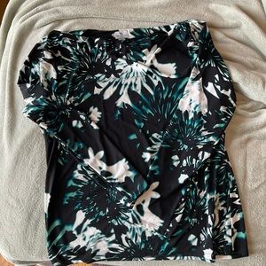 Beautiful colors in this slightly draped neck shirt.